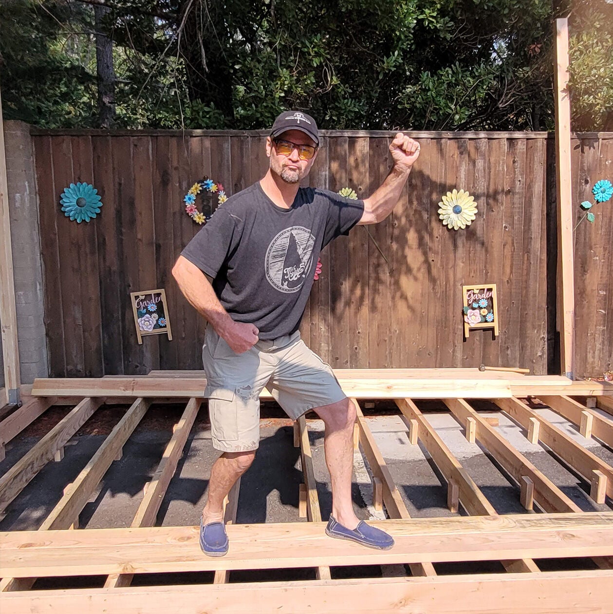 Photo of Jim Foley posing on a stage he built